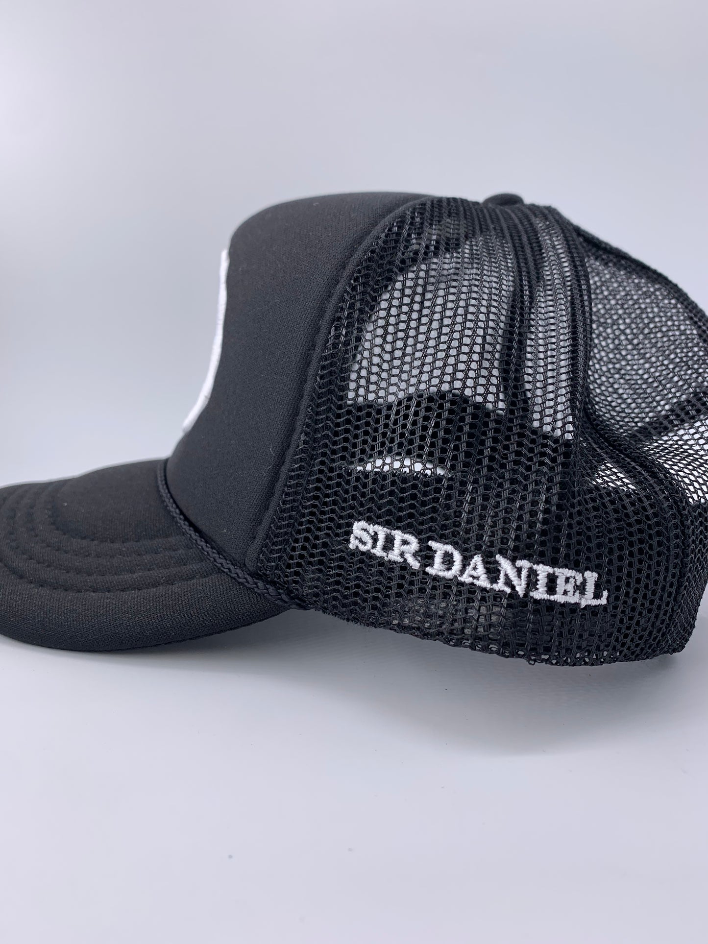 Black Sir Daniel Trucker Hat